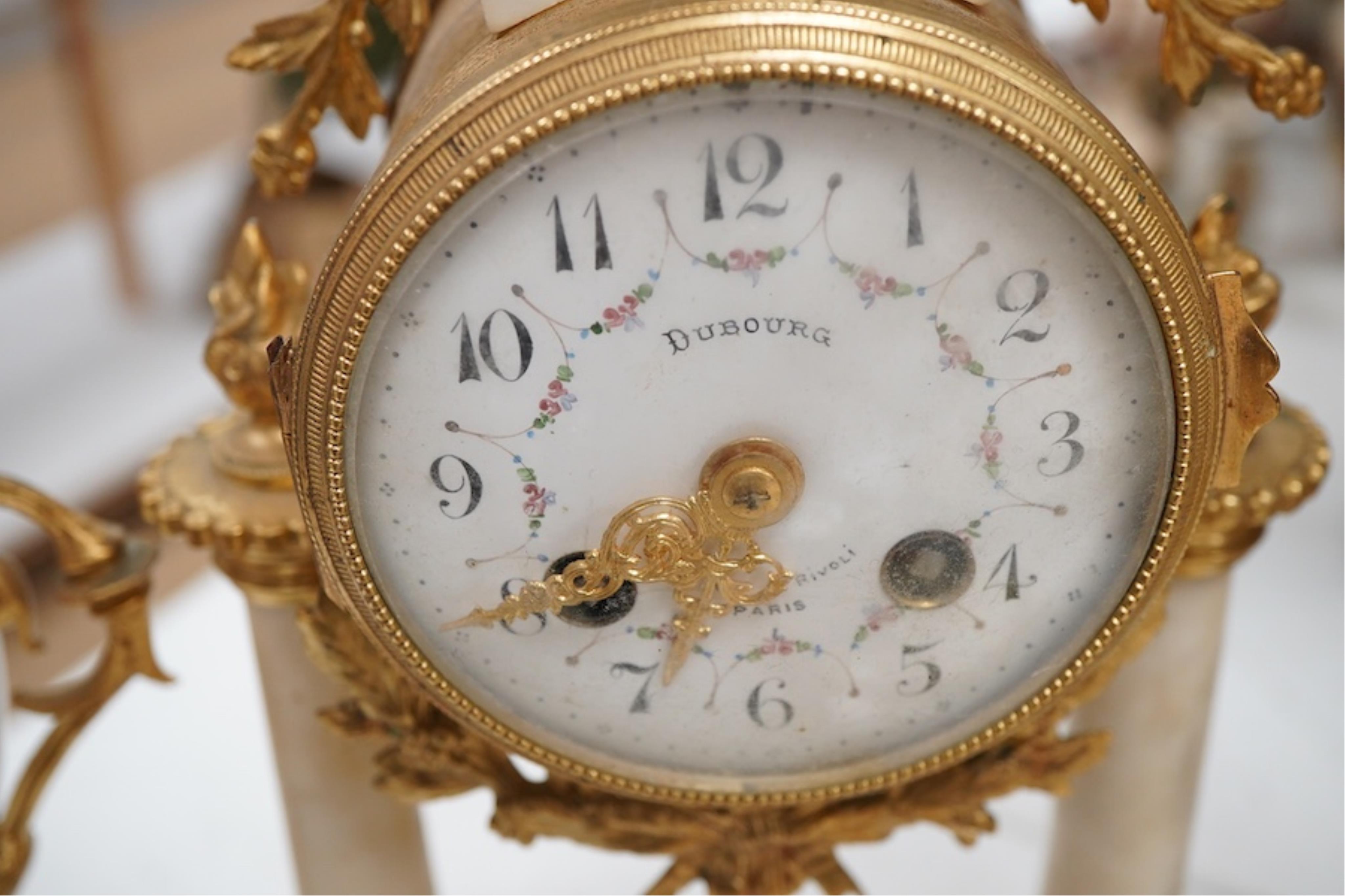 A late 19th century French gilt metal mounted clock garniture, 41cm